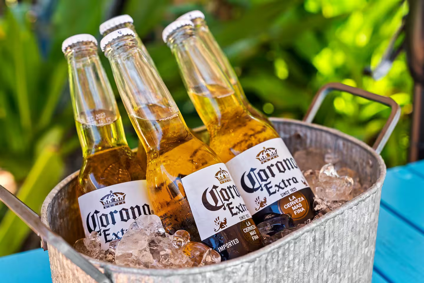 Cold Coronas in an ice bucket outdoors — relax and unwind at your private Pompano Beach waterfront retreat